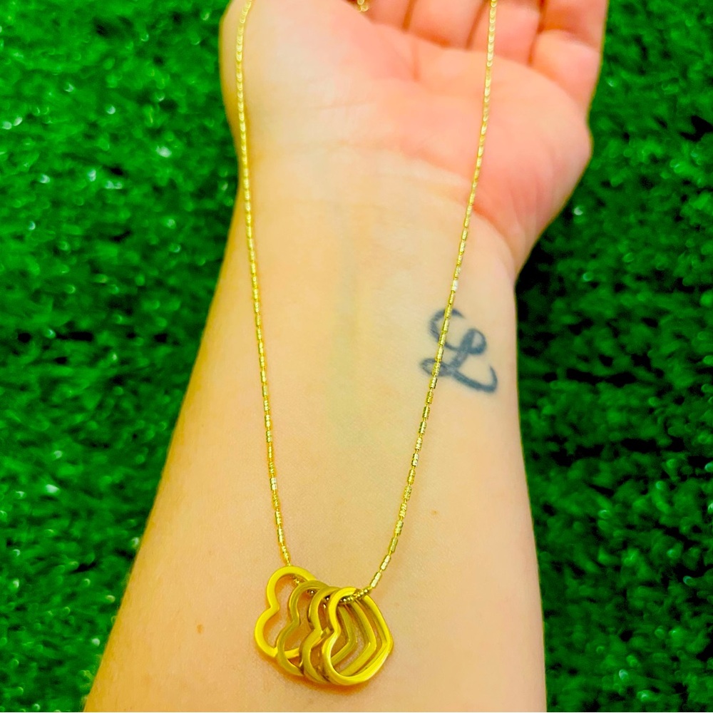 Stainless steel handmade necklace with 4 hearts. New!